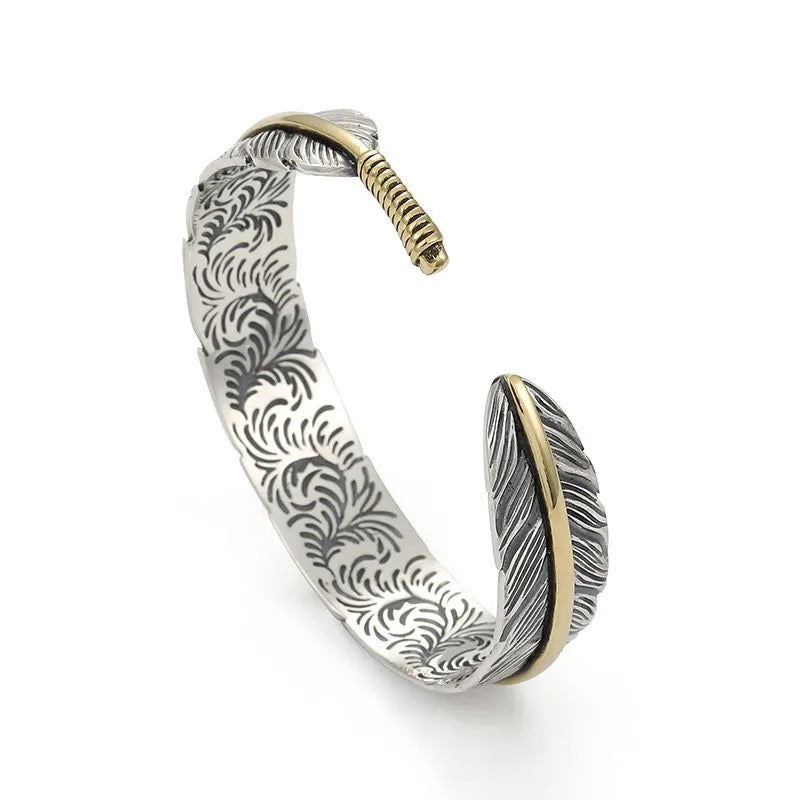 (1+1 GRATIS) Avian™ | Vintage geïnspireerde veren armband met Edgy Punk uitstraling