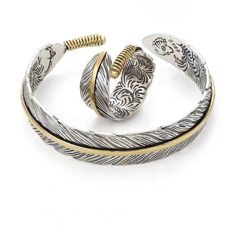 (1+1 GRATIS) Avian™ | Vintage geïnspireerde veren armband met Edgy Punk uitstraling